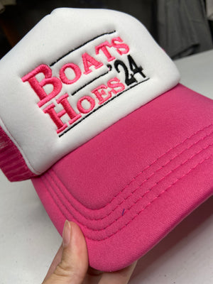 Boats hoes ‘24 hot pink & white trucker hat with hot pink & black thread
