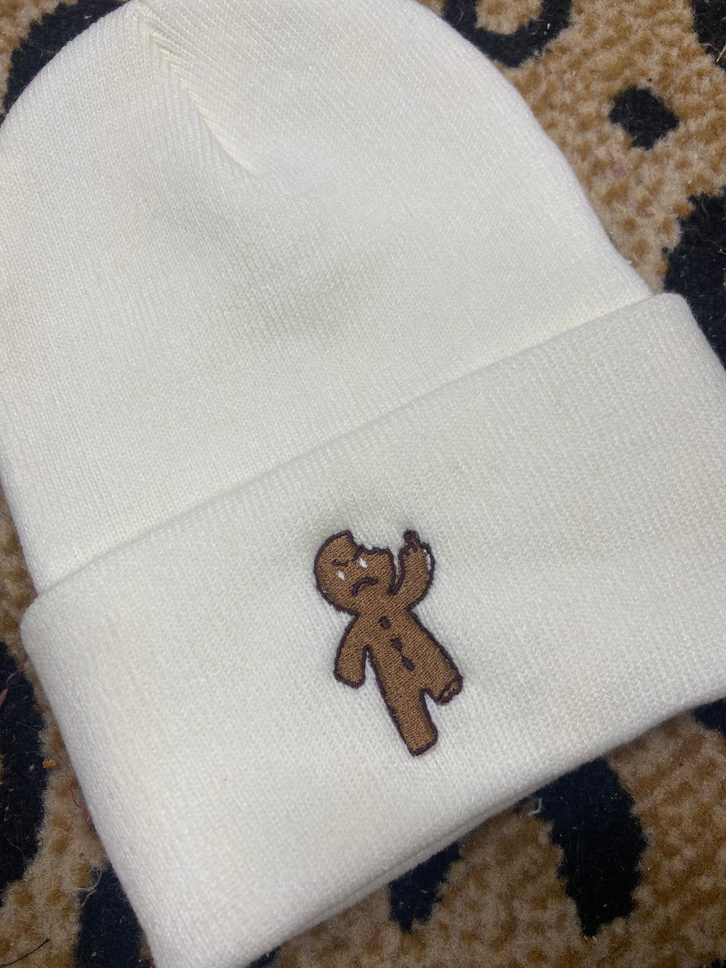 Gingerbread man middle finger beanie